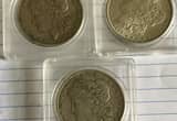 3- morgan silver Dollars