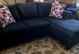 Black Reversible Ottoman Sofa-Like New