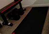 bow flex, dumbbells, and bench
