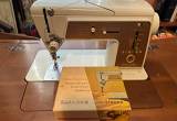 Vintage Singer touch and sew in cabinet