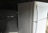Refrigerator with freezer on top