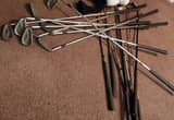 15 used golf clubs