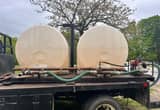 (2) 750 gallon water tanks