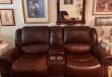 Two Leather Loveset Recliners