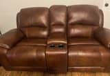Leather Rocking/ Reclining Love Seat