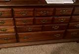 Brown dresser with 9 drawers